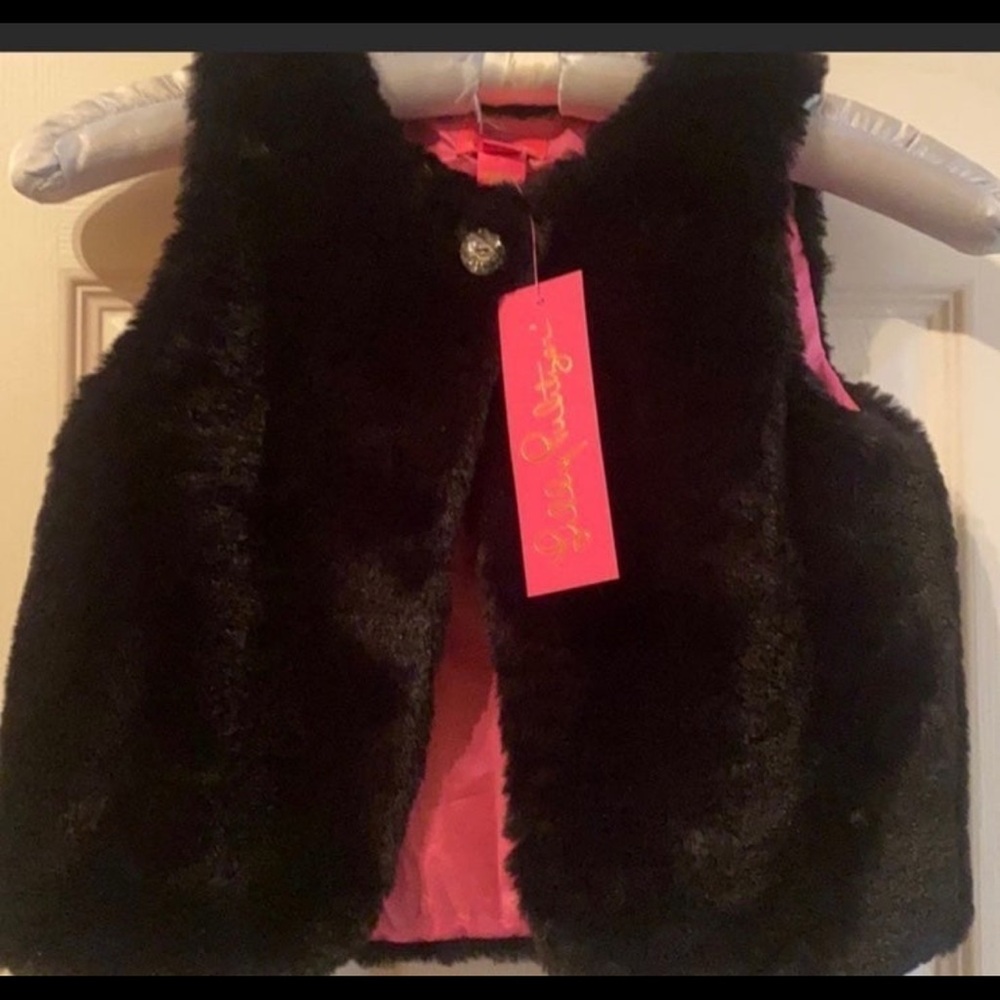 Black faux fur vest